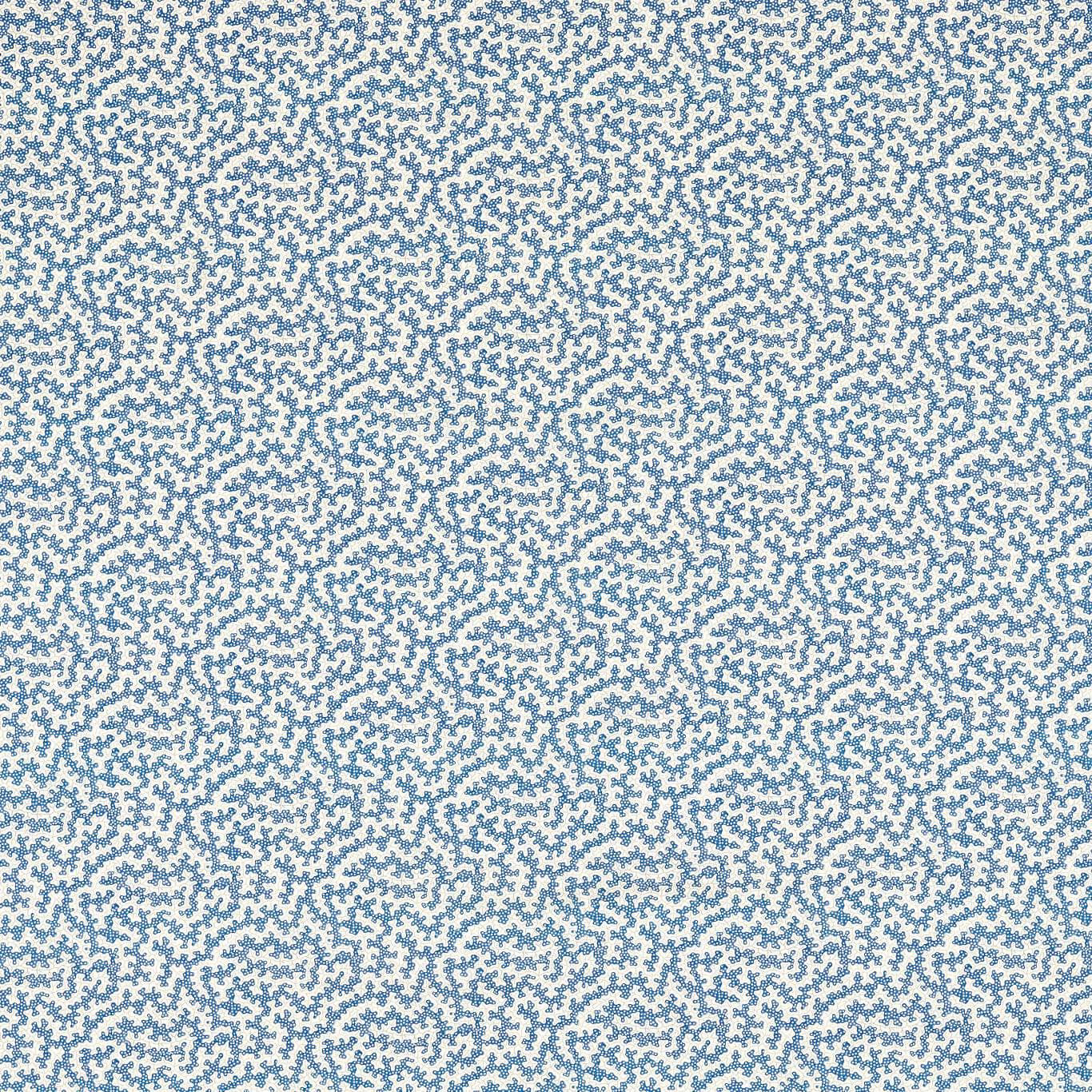 Close-up of pale ground fabric with dense indigo small-scale dotted pattern
