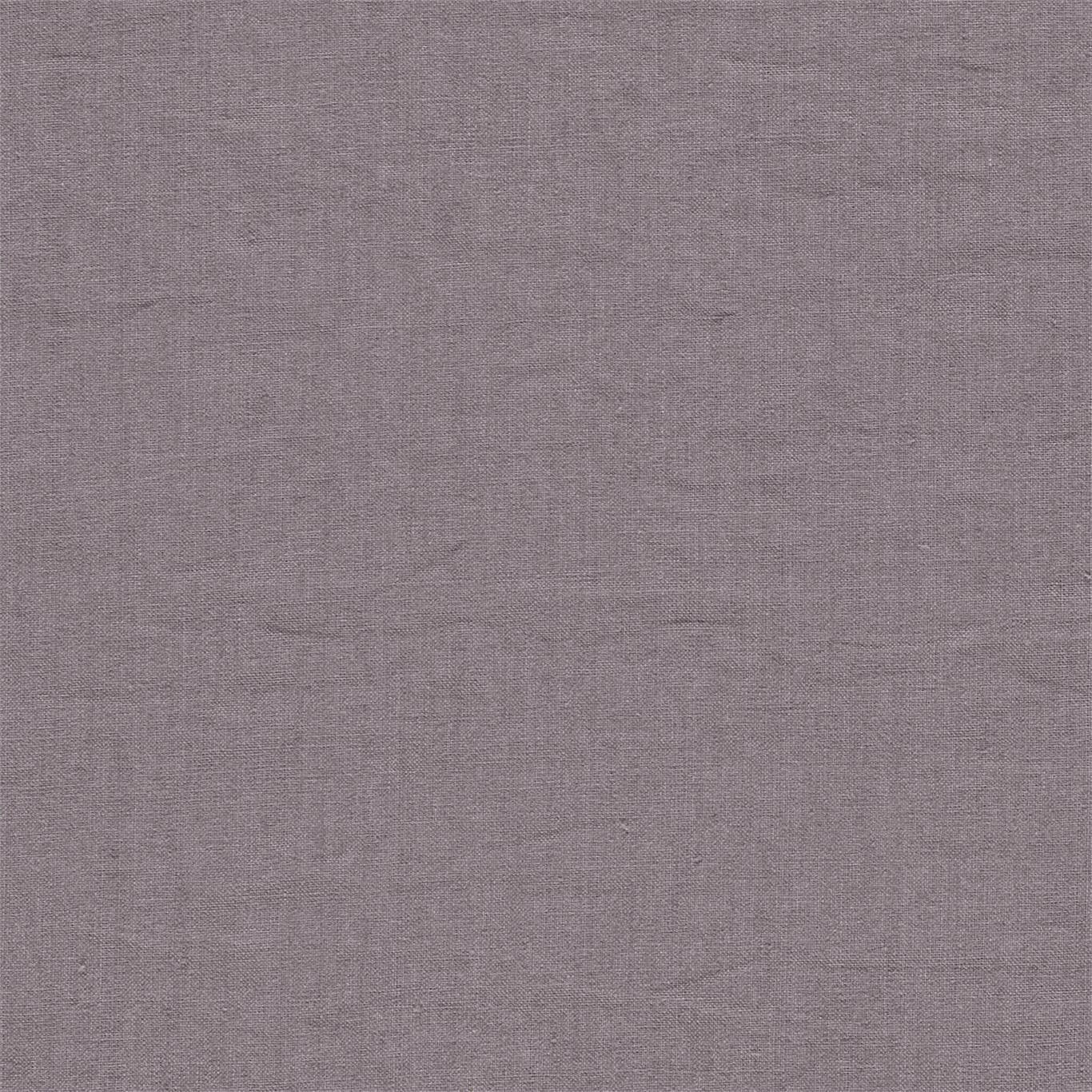 Close-up of dusty mauve pink plain linen with a soft slubbed texture