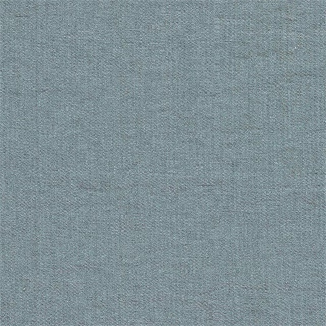 Close-up of soft blue-grey linen weave with a subtly mottled plain surface