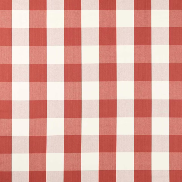 Coral red and cream checked fabric with a fine woven texture