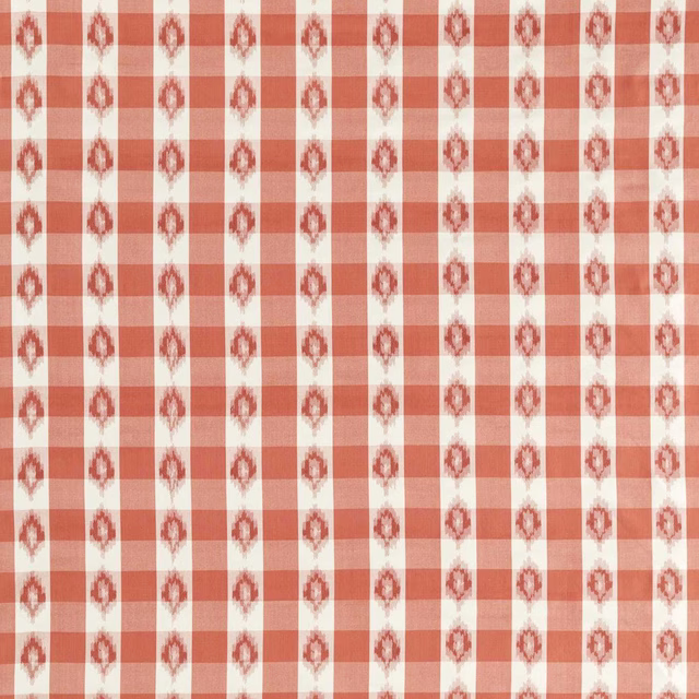 Coral and ivory checked fabric with repeating ikat motif