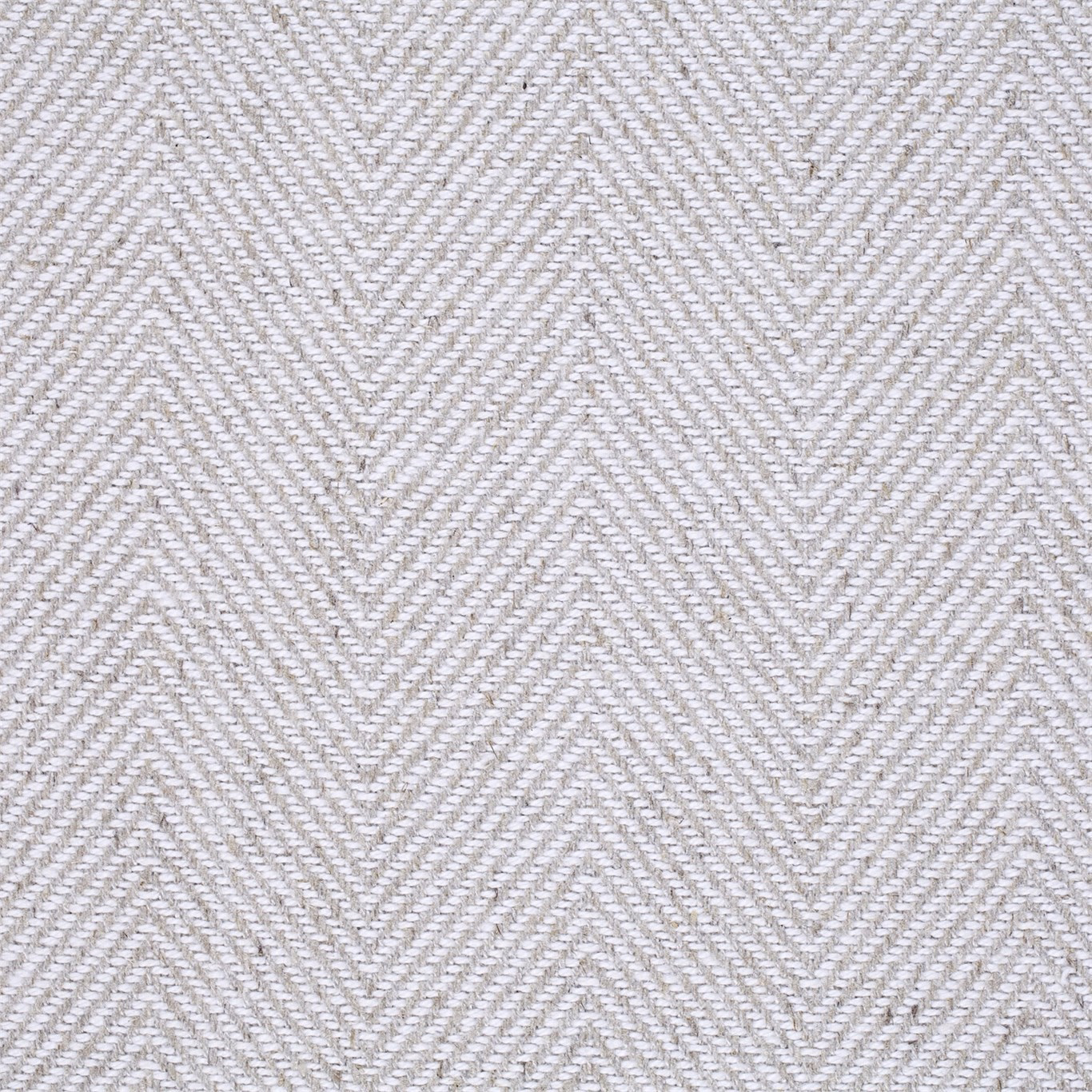 Soft ecru herringbone weave fabric with a subtle textured chevron pattern