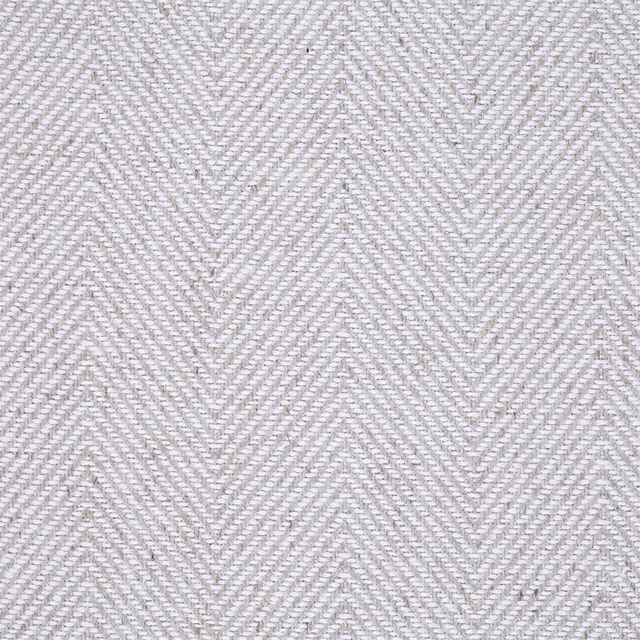 Soft ecru herringbone weave fabric with a subtle textured chevron pattern