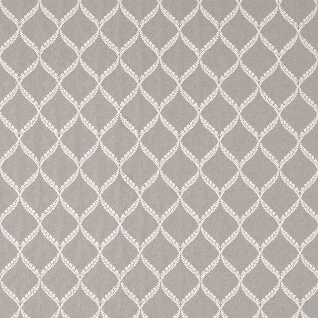Soft taupe lattice fabric with white leaf-like outlines and linen texture