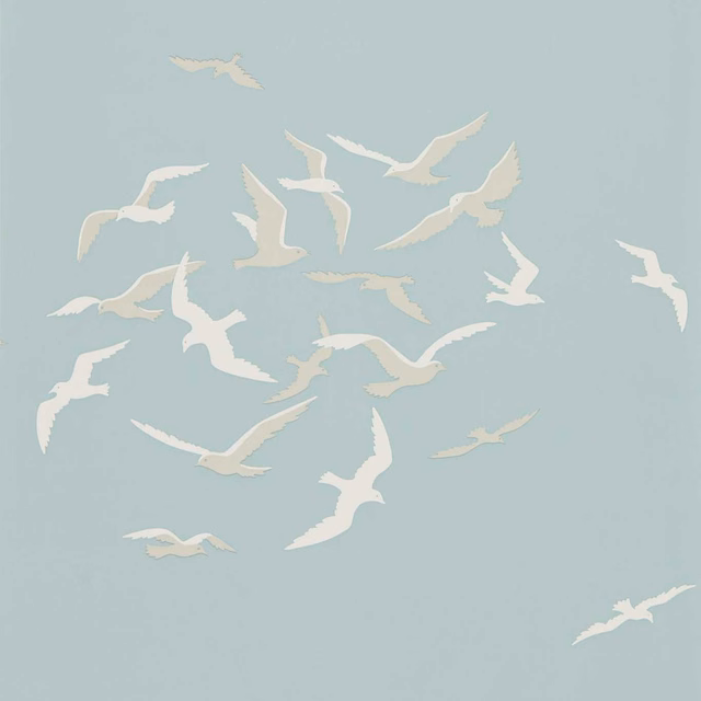 Pale powder-blue wallpaper with scattered cream seagull silhouettes gliding across the surface