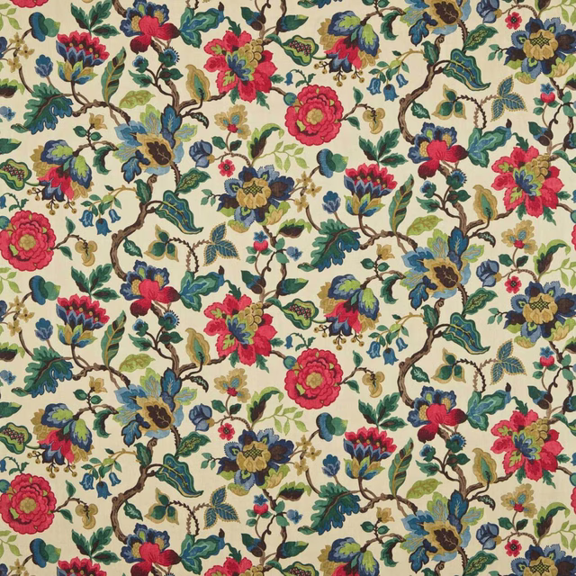 Cream-ground floral fabric with ruby, emerald, teal and gold branches