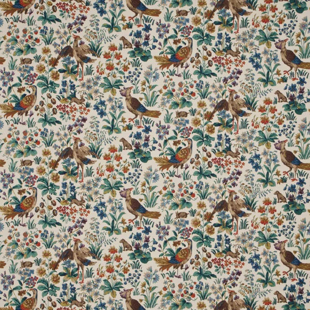 Cream woven fabric with multicolour birds, leaves and floral motifs