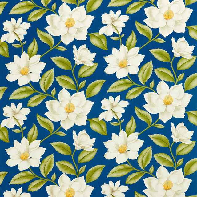 Bright blue floral fabric with cream blossoms, green leaves and yellow centres