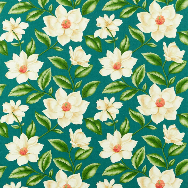 Teal printed fabric with large cream flowers and green leafy stems