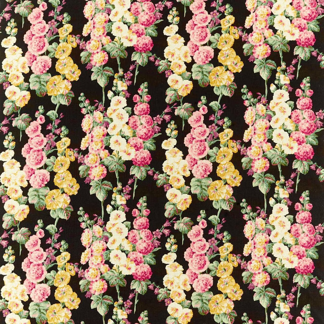 Vertical hollyhock floral fabric with pink, cream and yellow blooms on an ebony ground