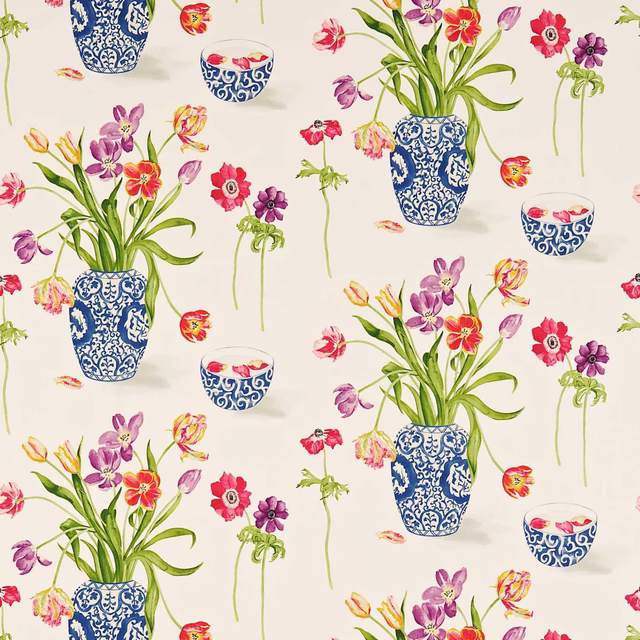 Painterly floral fabric with blue vases, violet blooms and crimson flowers on ivory