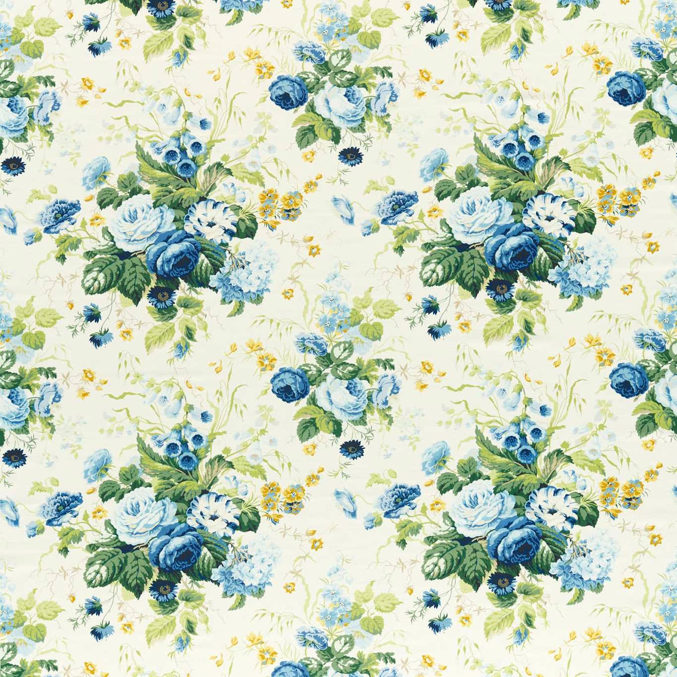 Large blue and green floral fabric on a cream ground with yellow accents