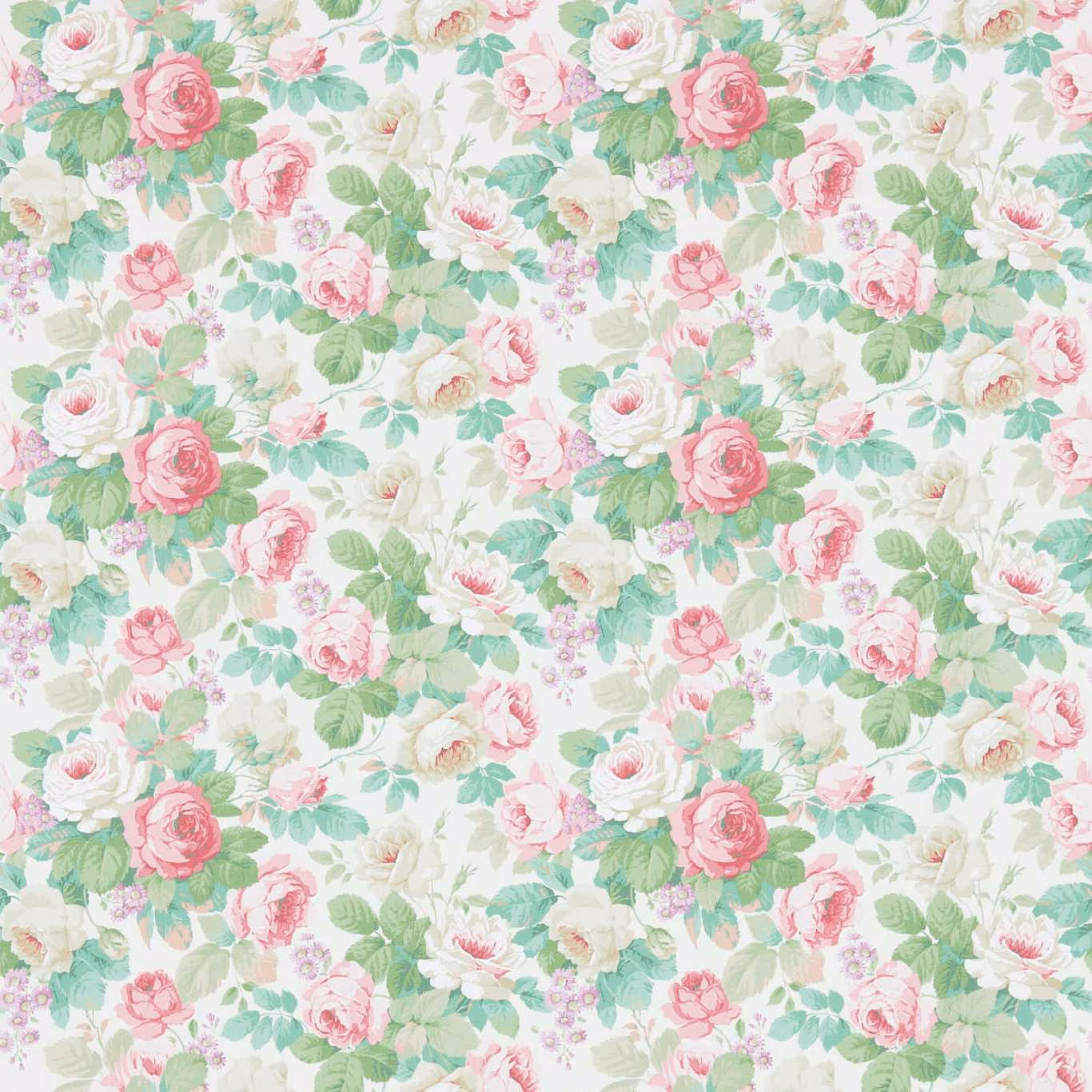 Soft pink roses and celadon leaves in a dense floral wallpaper on cream