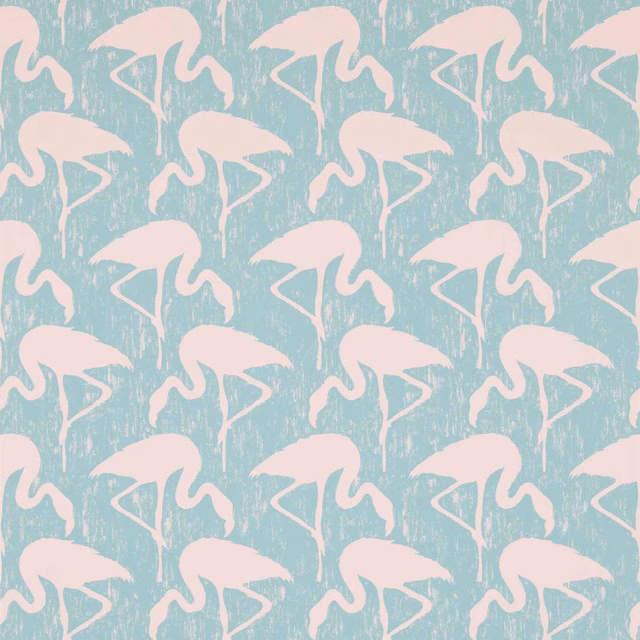 Blush pink flamingos repeating across a distressed pale turquoise wallpaper ground
