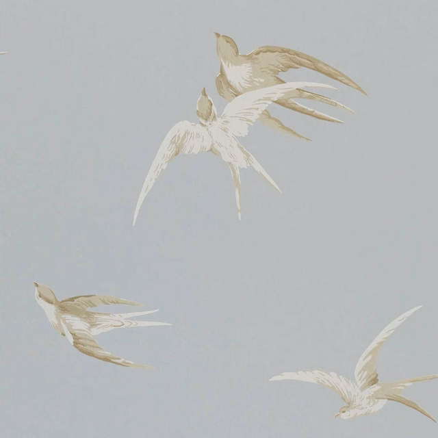 Pale blue-grey wallpaper with ivory and beige swallows flying across the surface