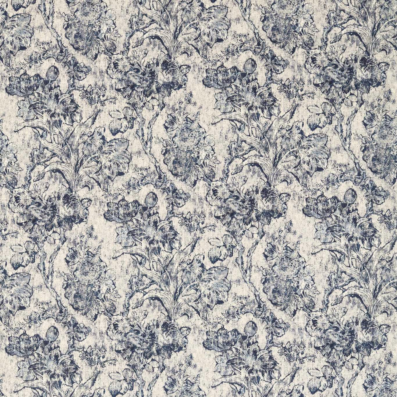 Blue-grey floral toile fabric on a pale ground with a softly weathered print