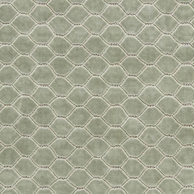 Soft sage-green velvet with a linked geometric pattern and plush brushed pile