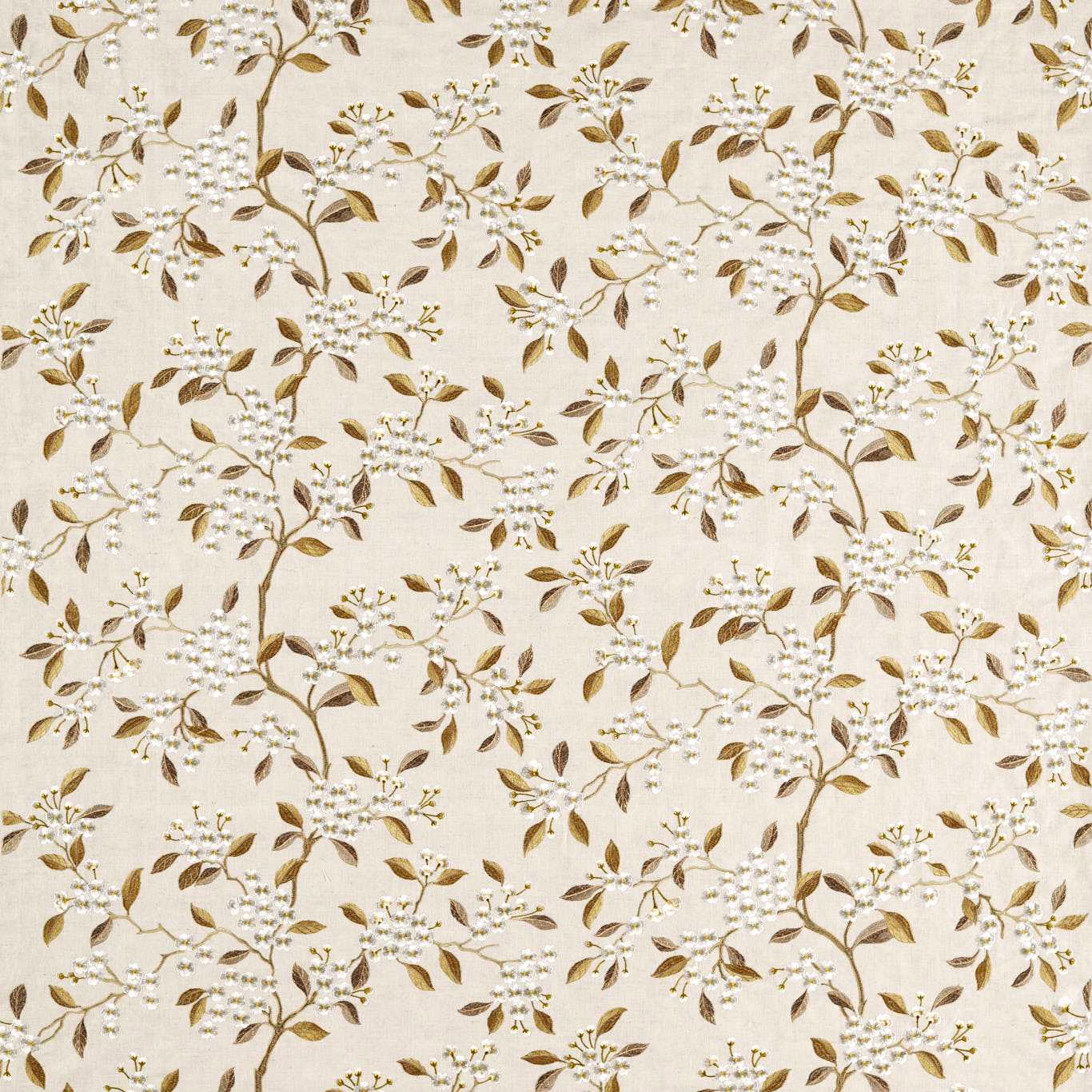 Cream botanical fabric with trailing brown leaves and small pale blossoms