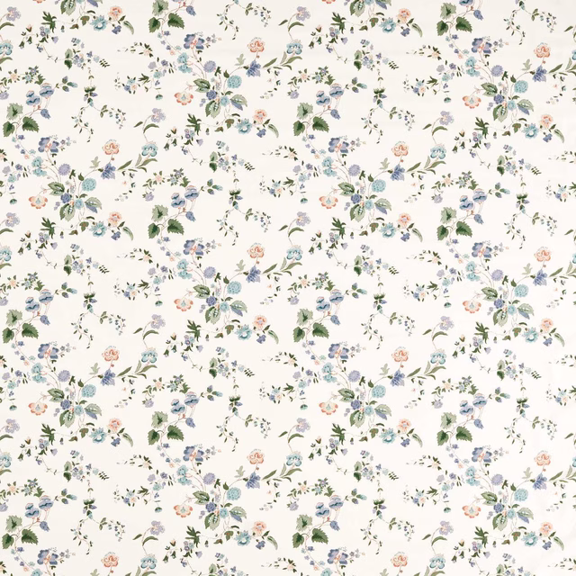 Cream ground fabric with scattered cornflower blue and mauve floral sprays