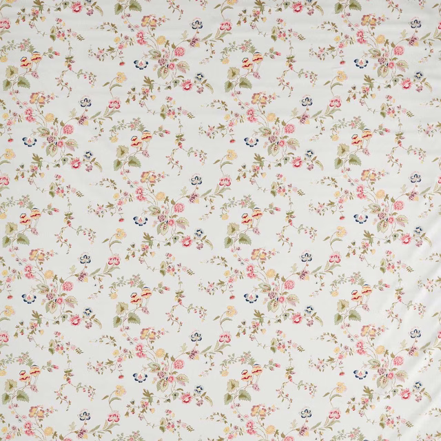 Porcelain cream floral fabric with small pink, yellow, olive and blue blossoms