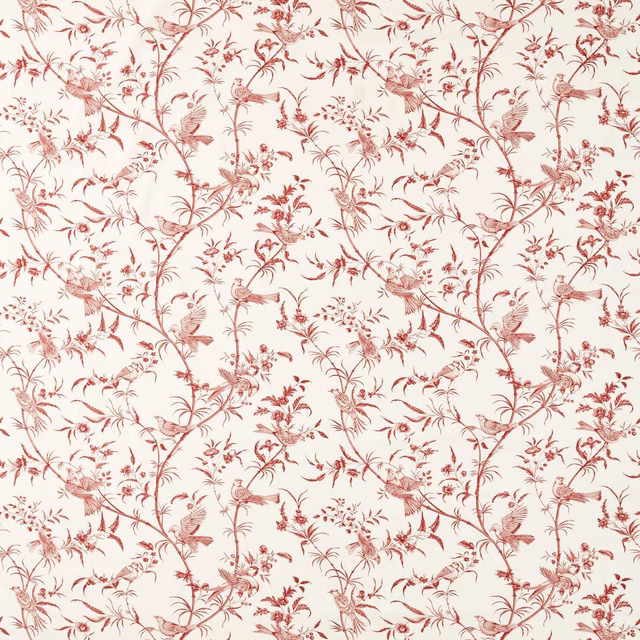 Madder red bird-and-botanical toile pattern on a cream ground