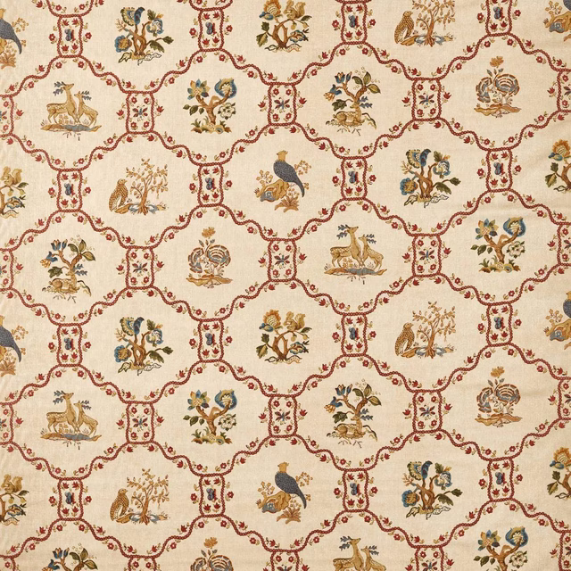 Patterned fabric swatch with wheat ground, fig-red lattice and small animal motifs