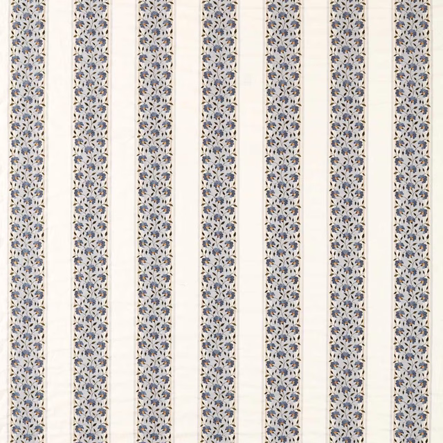 Vertical floral stripe fabric in cream and woad blue with fine leafy detailing