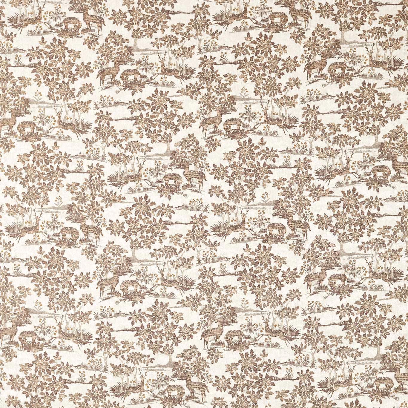Close-up of beige woodland print fabric with deer, trees and leafy branches
