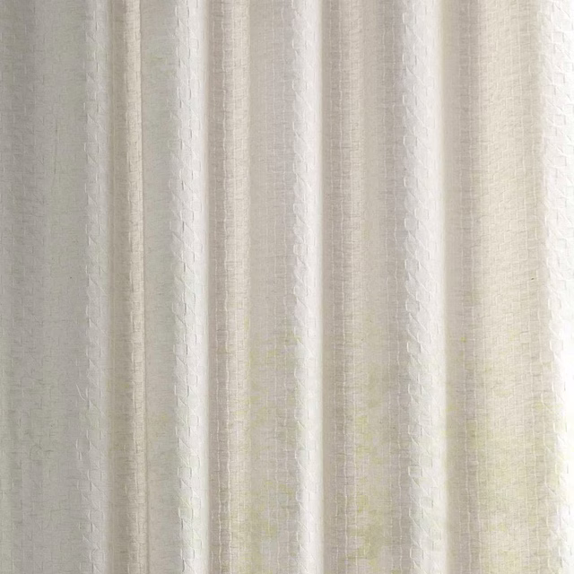 Pale ivory sheer fabric with subtle woven texture and soft vertical folds