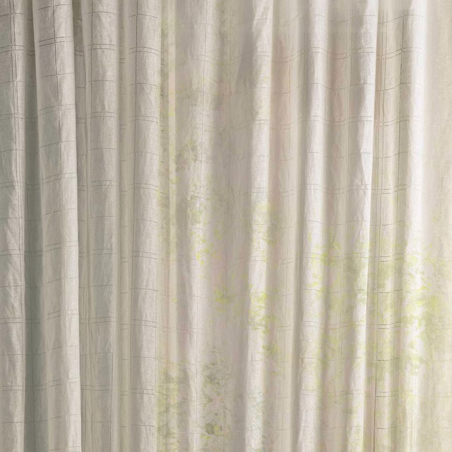 Sheer off-white fabric with subtle grid-like weave and pale seaspray tint