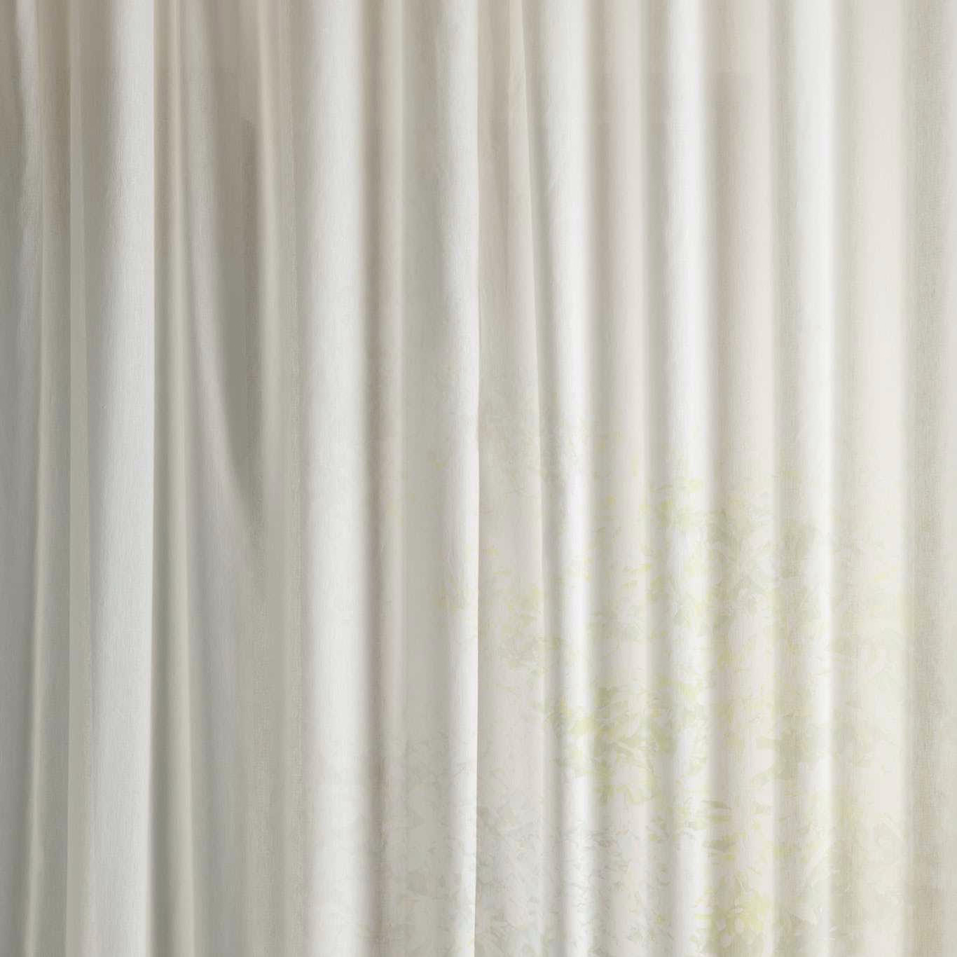 Pale ivory sheer fabric with faint seaspray floral pattern and soft vertical folds