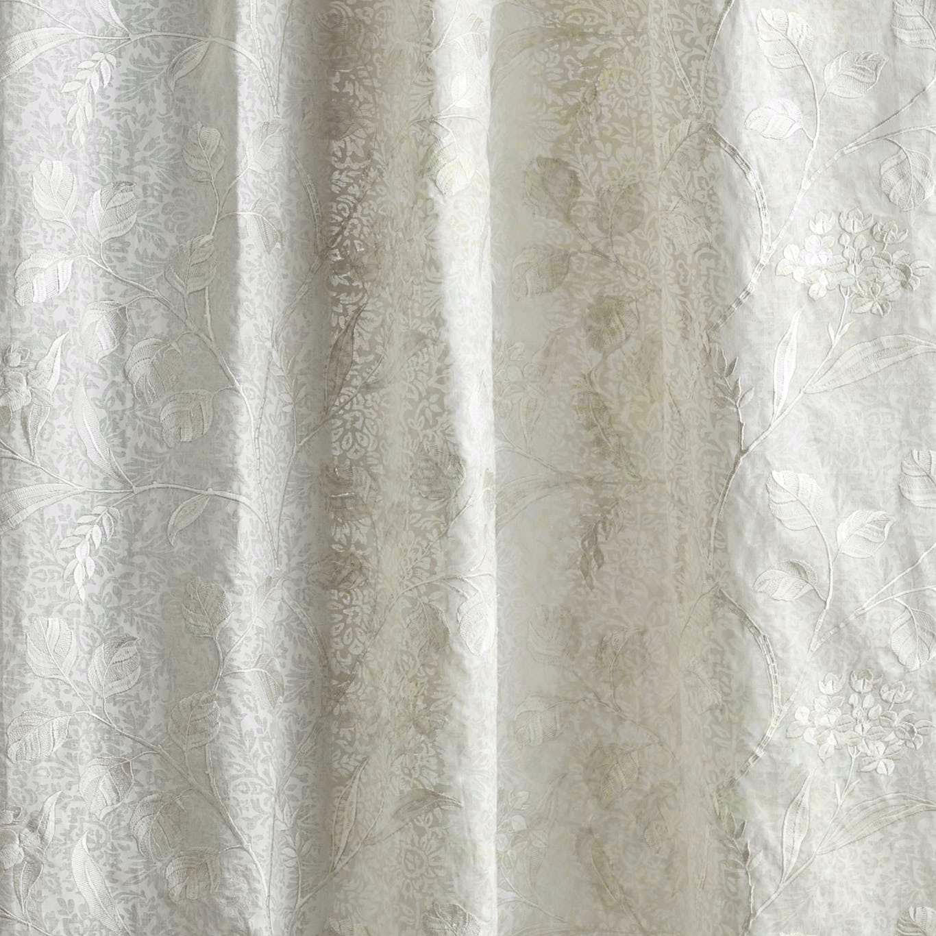 Sheer floral fabric in seaspray white with soft woven leaves and blooms