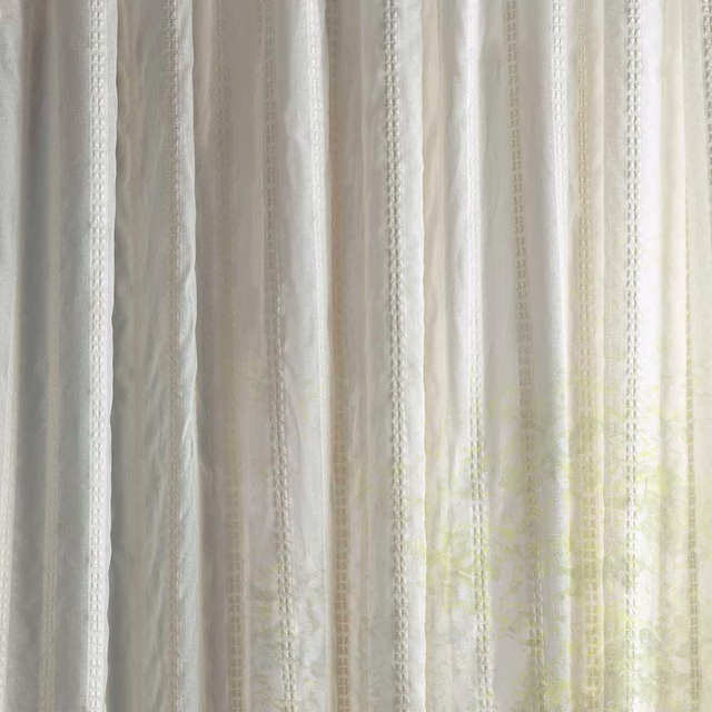 Sheer striped fabric in soft seaspray white with fine vertical texture