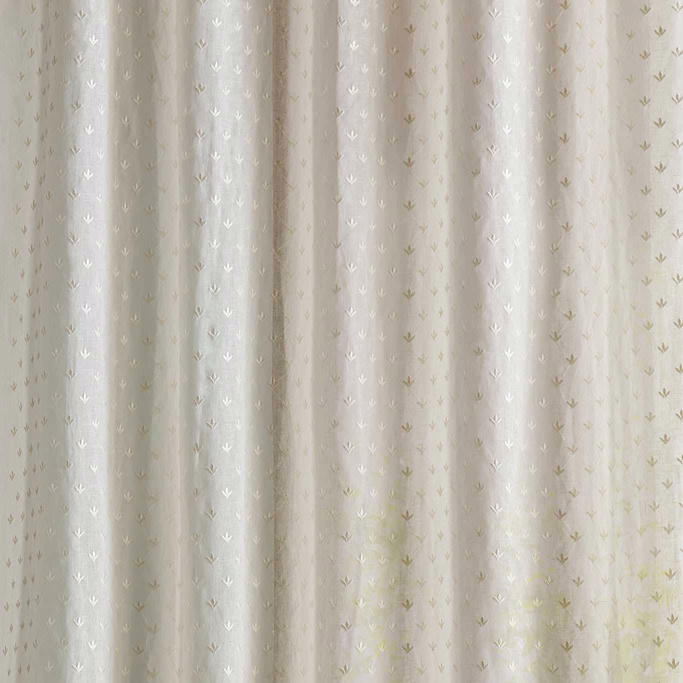 Cream sheer curtain fabric with tiny seaspray leaf motif and soft vertical folds