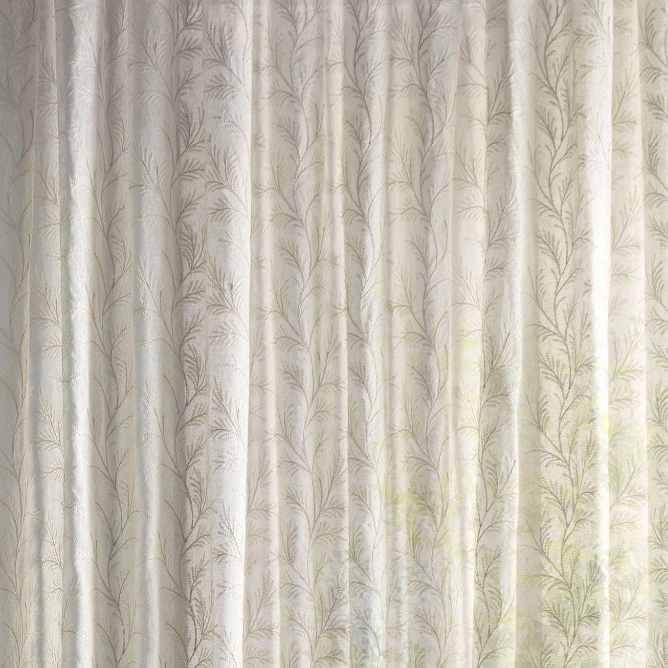 Pale cream sheer fabric with delicate fern motif and soft seafoam tint