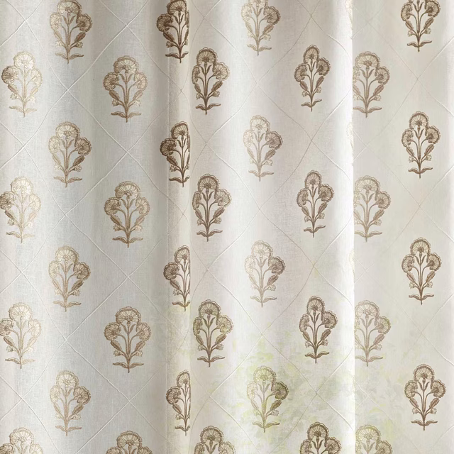 Sheer Sanderson fabric in sand ivory with small taupe botanical repeats