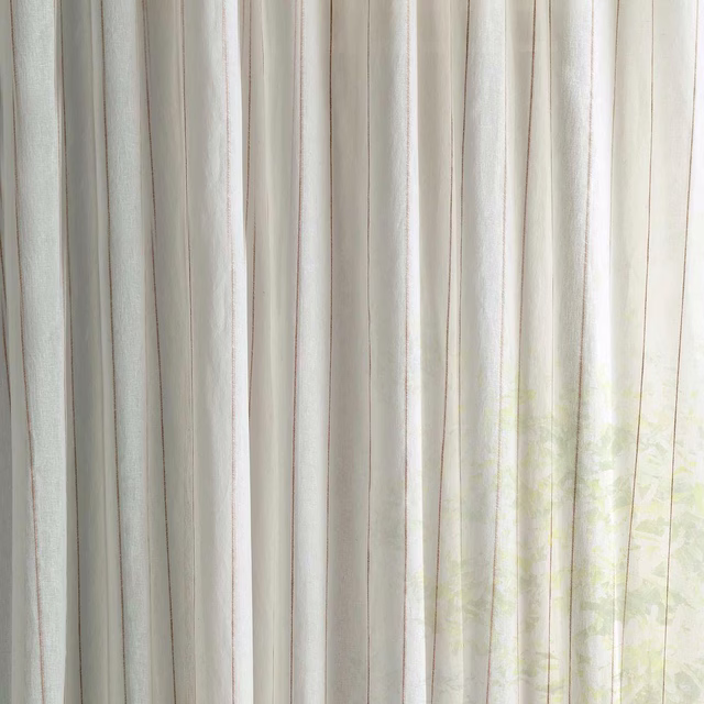Sheer cream striped fabric with fine vertical blush-beige lines, softly lit