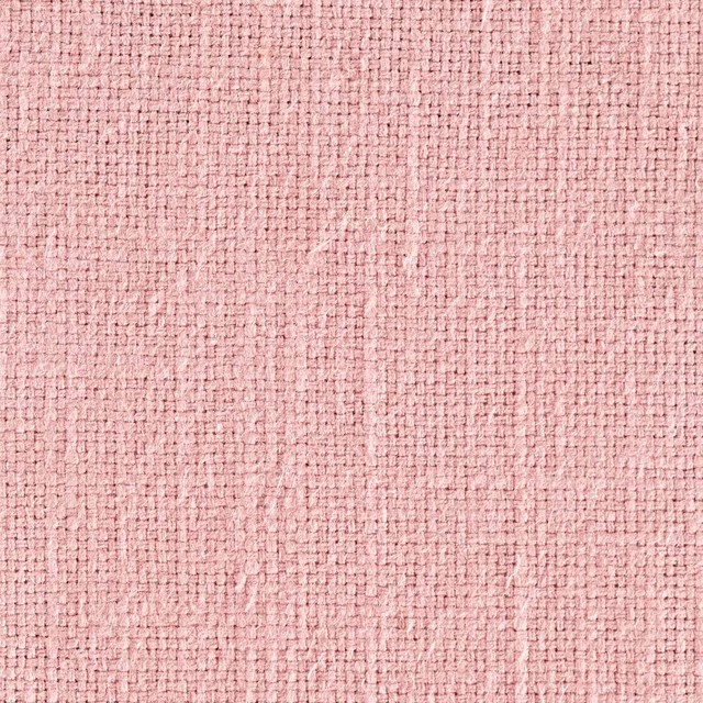 Close-up of a dusty pink woven fabric with a neat textured basket weave