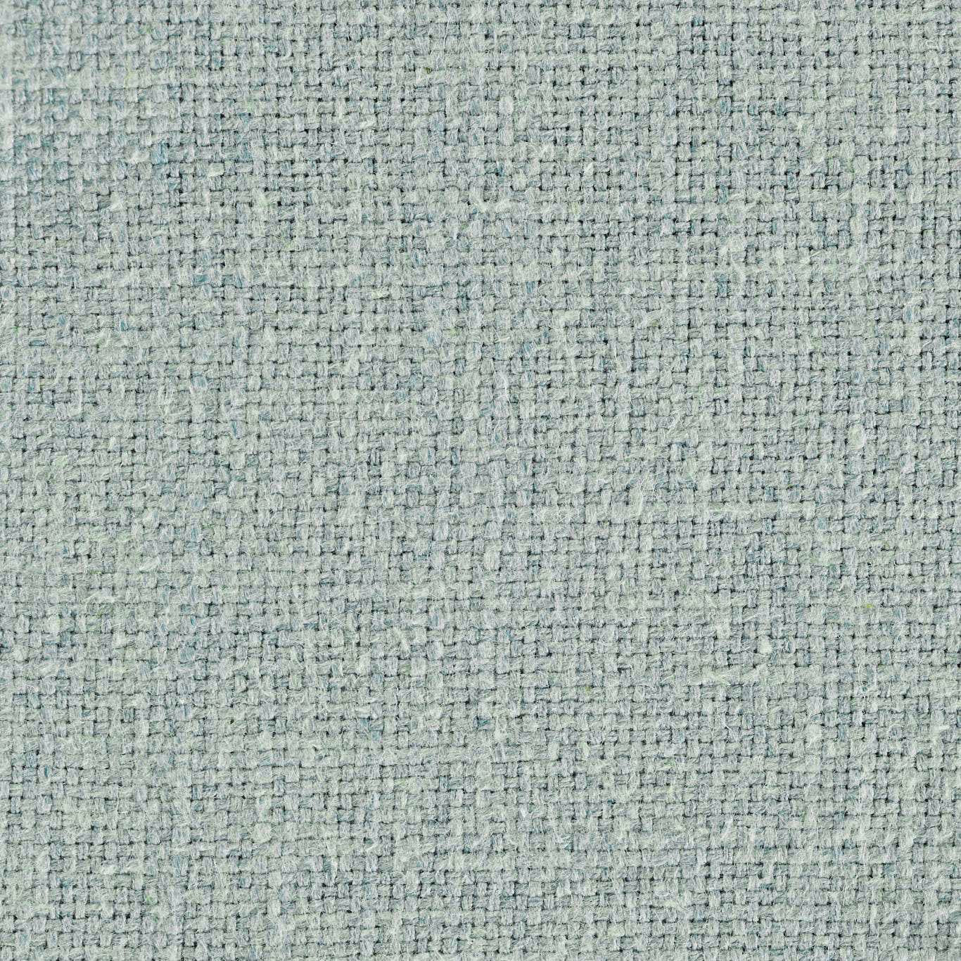 Close-up of pale duck egg blue woven upholstery fabric with fine textured weave