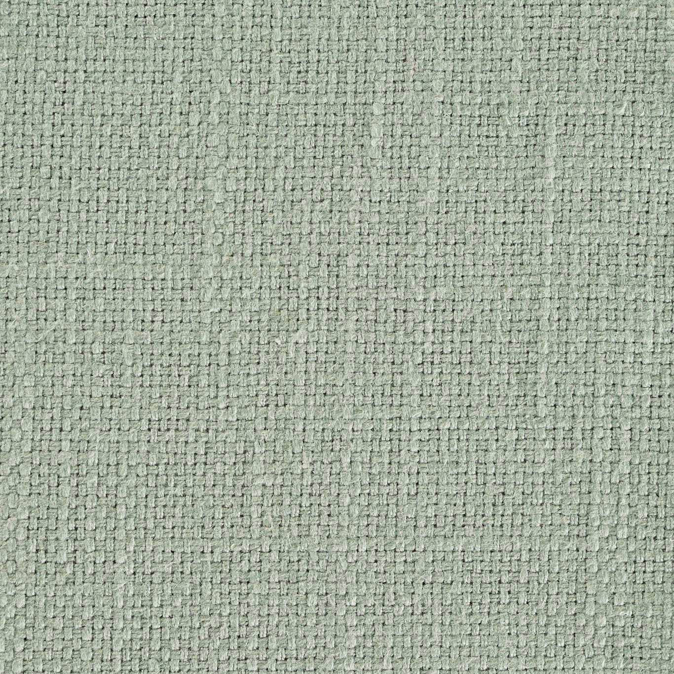 Close-up of a soft sage green woven upholstery fabric with grainy texture