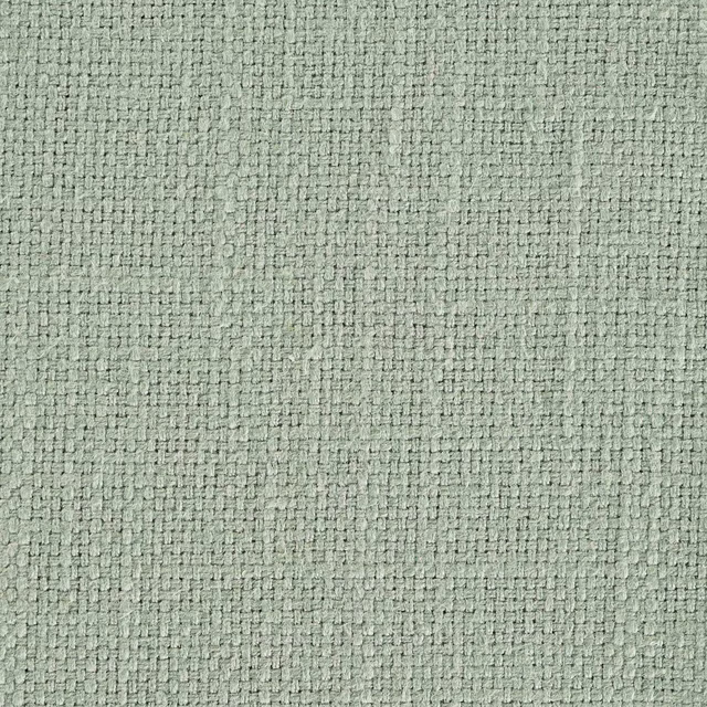 Close-up of a soft sage green woven upholstery fabric with grainy texture