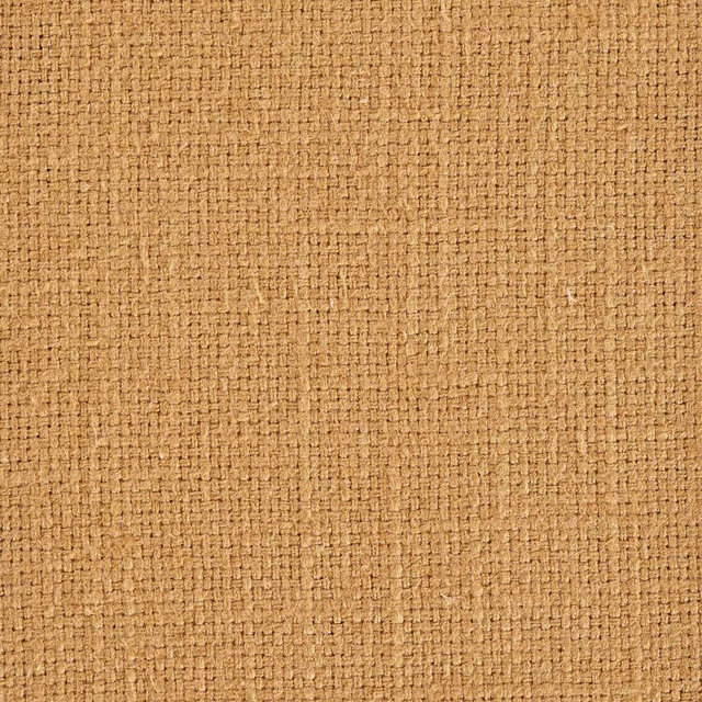 Close-up of warm hay-gold woven fabric with a tight, textured plain weave