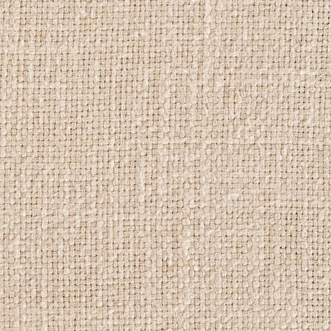 Warm beige slub weave fabric with a textured plain surface