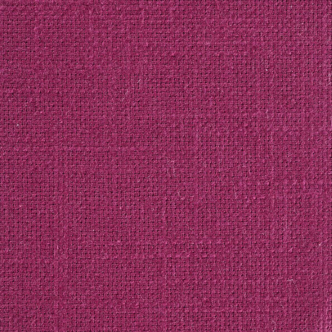 Close-up of a deep mulberry pink woven fabric with a textured basket weave