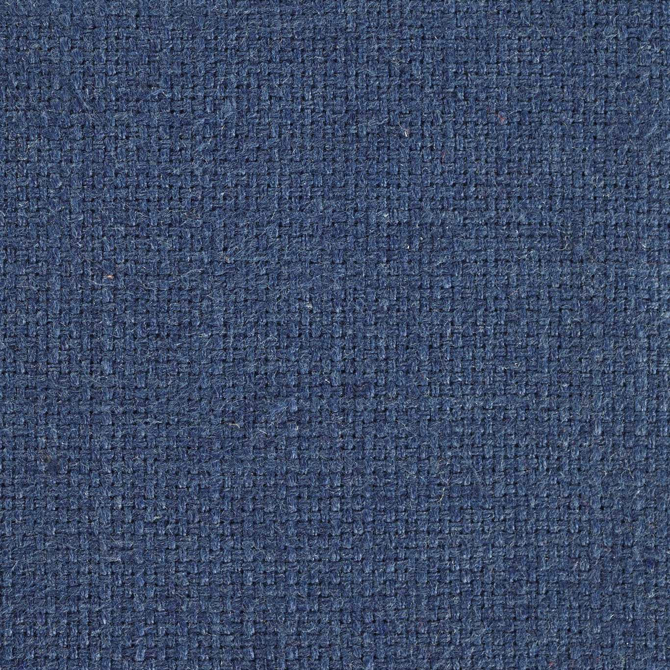 Close-up of a deep navy woven fabric with fine textured plain weave