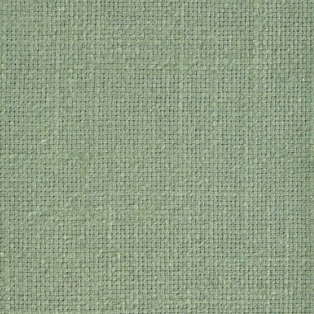 Close-up of a soft sage green textured woven fabric