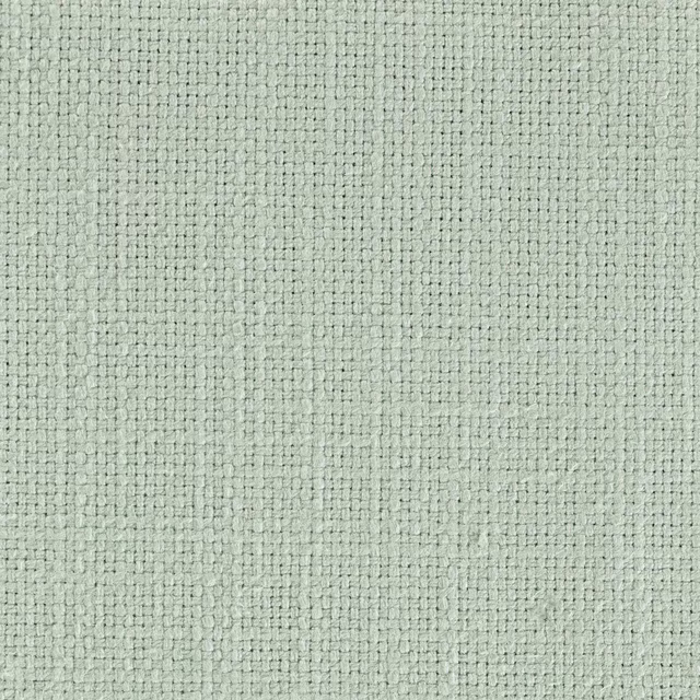 Close-up of a pale silver-mint woven fabric with a fine nubby texture