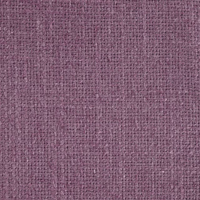 Close-up of dusty mauve woven upholstery fabric with a textured plain weave