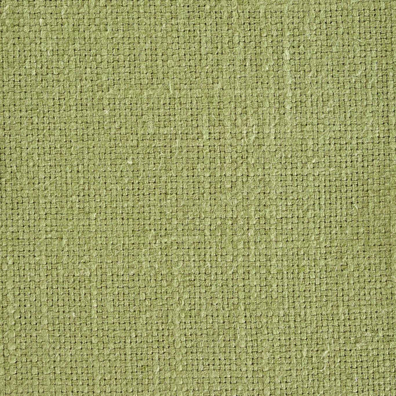 Close-up of muted moss green woven fabric with a coarse textured surface