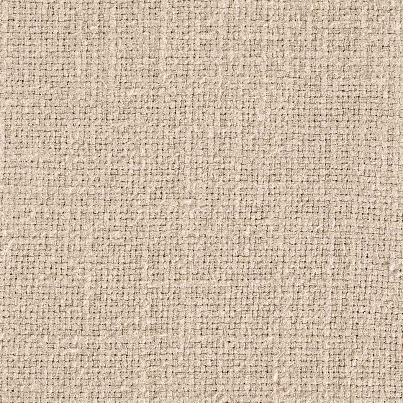 Close-up of parchment beige woven fabric with a nubby textured surface